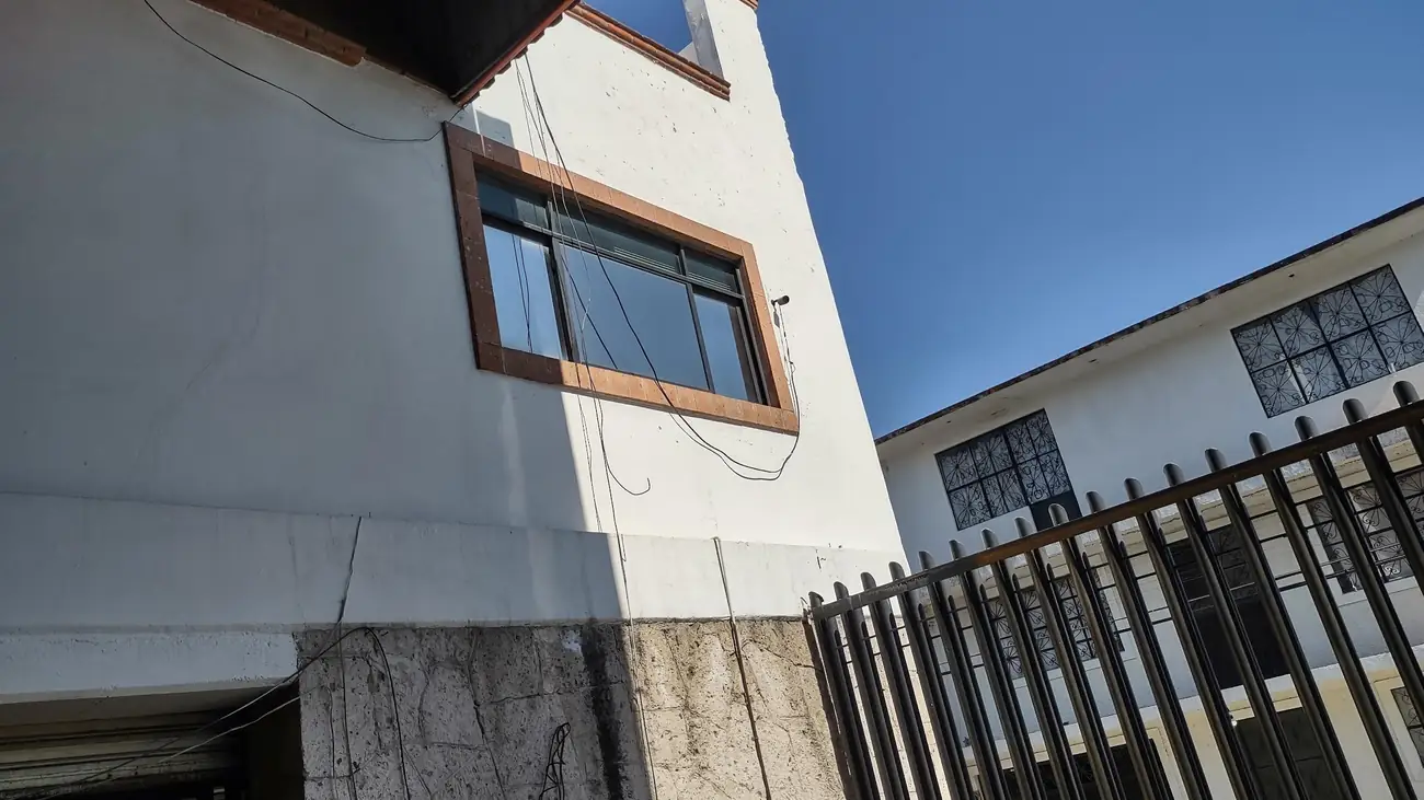 Security camera installed on building front