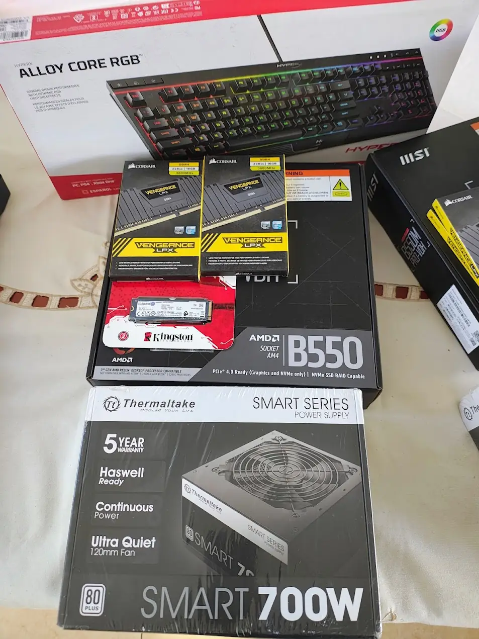 Motherboard, memory, drive and power supply ready to assemble